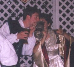 bride_and_groom_drinking_from_goblet.jpg - 14694 Bytes